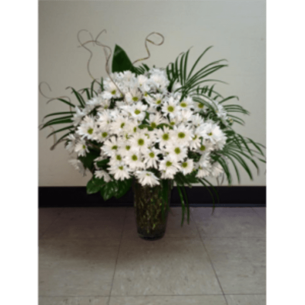 White daisy bouquet in a dark glass vase
