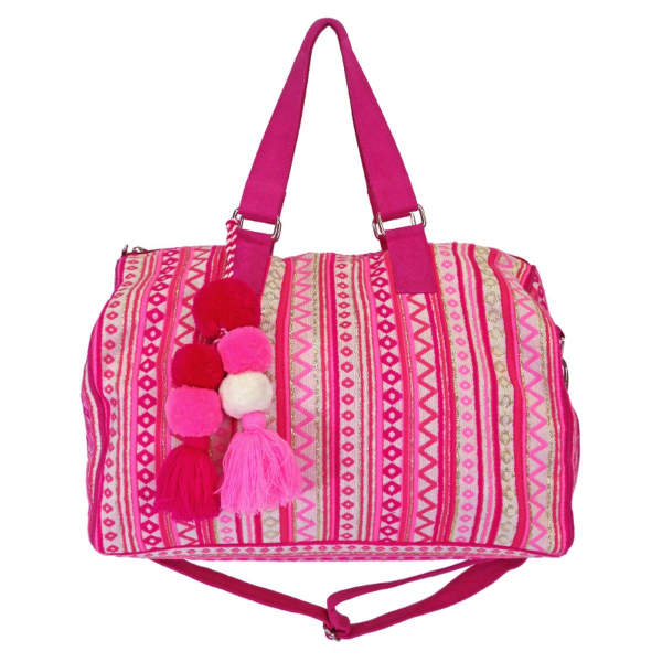 Pink patterned duffel bag with pom-pom tassels