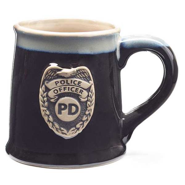Dark ceramic mug with a police officer badge emblem