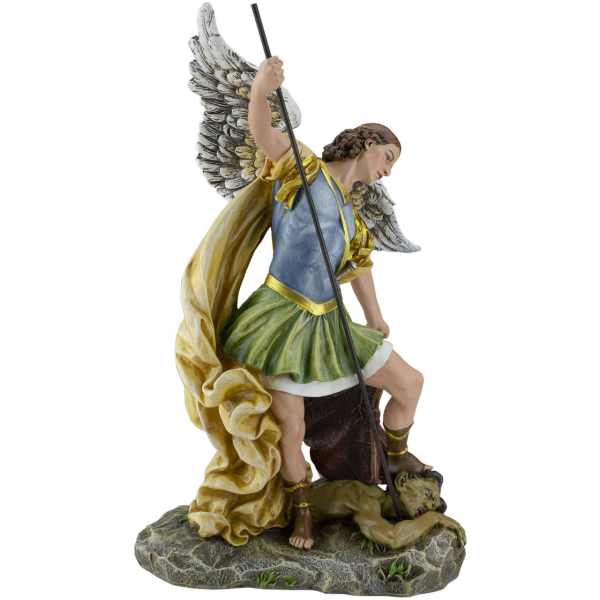 Angel figurine with wings holding a spear over a fallen figure