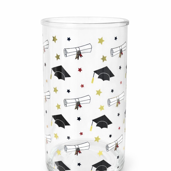 Clear glass tumbler with graduation cap and diploma pattern