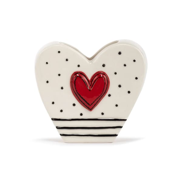 Heart-shaped ceramic vase with a red heart and black dots