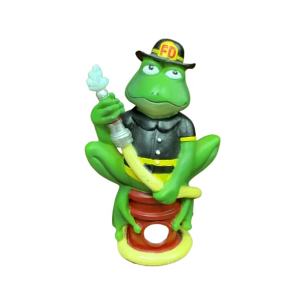 Green frog firefighter figurine holding a hose