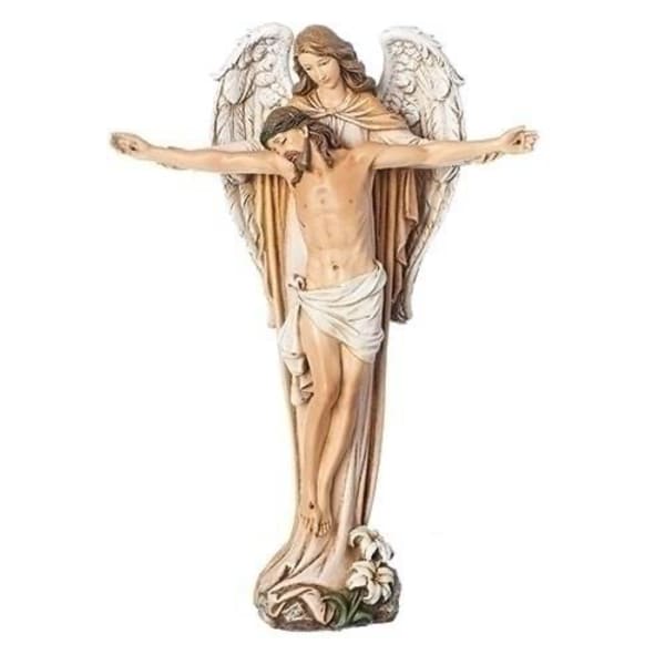 Religious statue of Jesus with an angel behind him