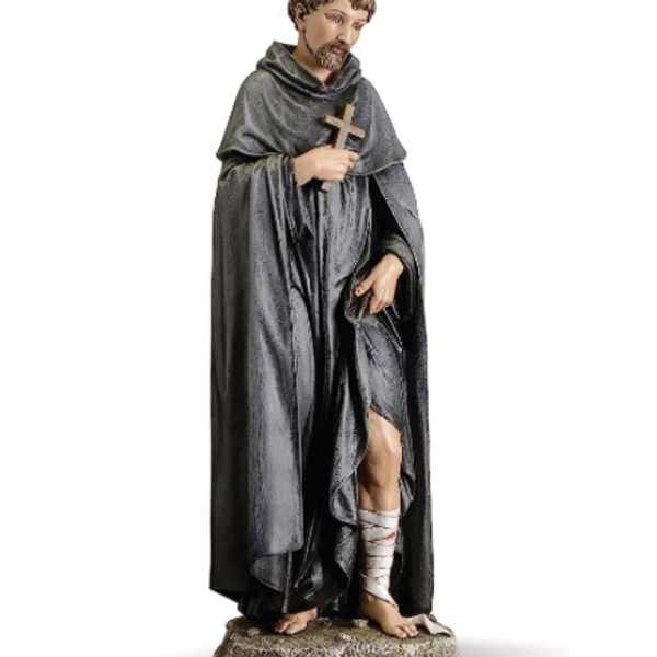 Religious statue of a robed saint holding a cross