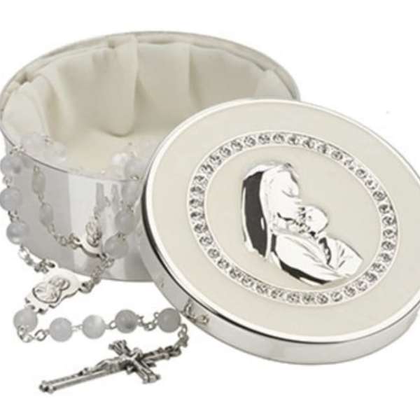 Silver rosary in an open round keepsake box