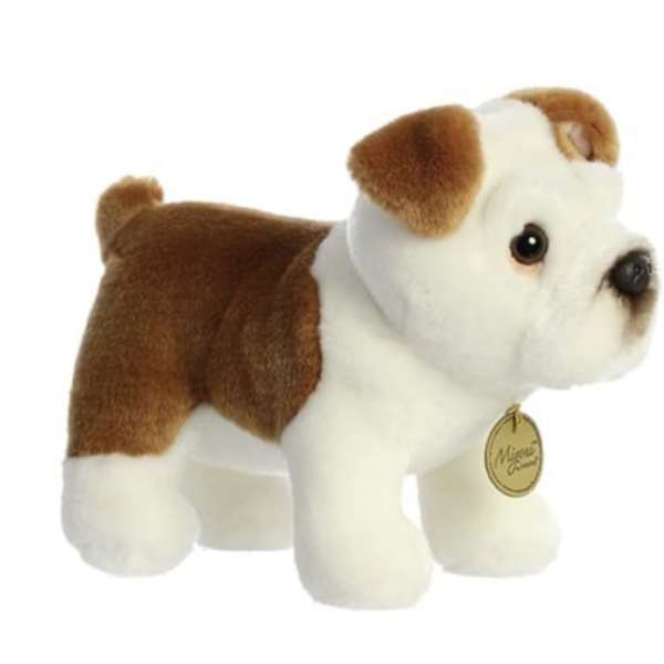 Small brown and white plush bulldog toy with a round gold tag at its neck