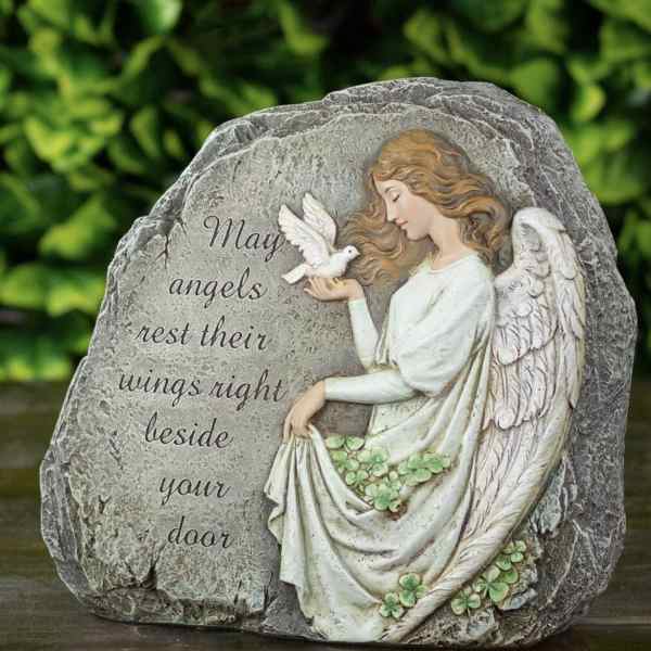Angel memorial stone with a dove and engraved sympathy message