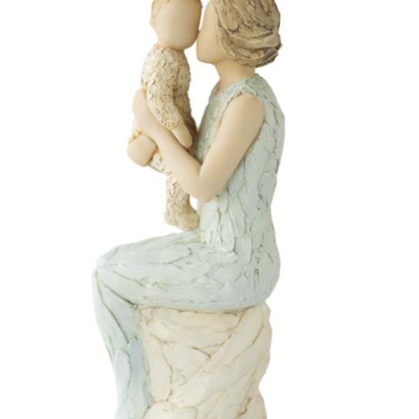 Figurine of a seated woman holding a child