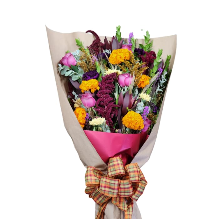 Mixed bouquet with pink roses, marigolds, and purple flowers wrapped in paper