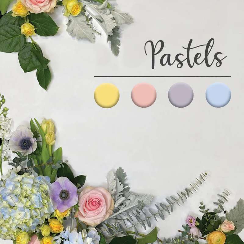 Pastel flowers arranged around the edges of a white background with the word 'Pastels' and four color dots.