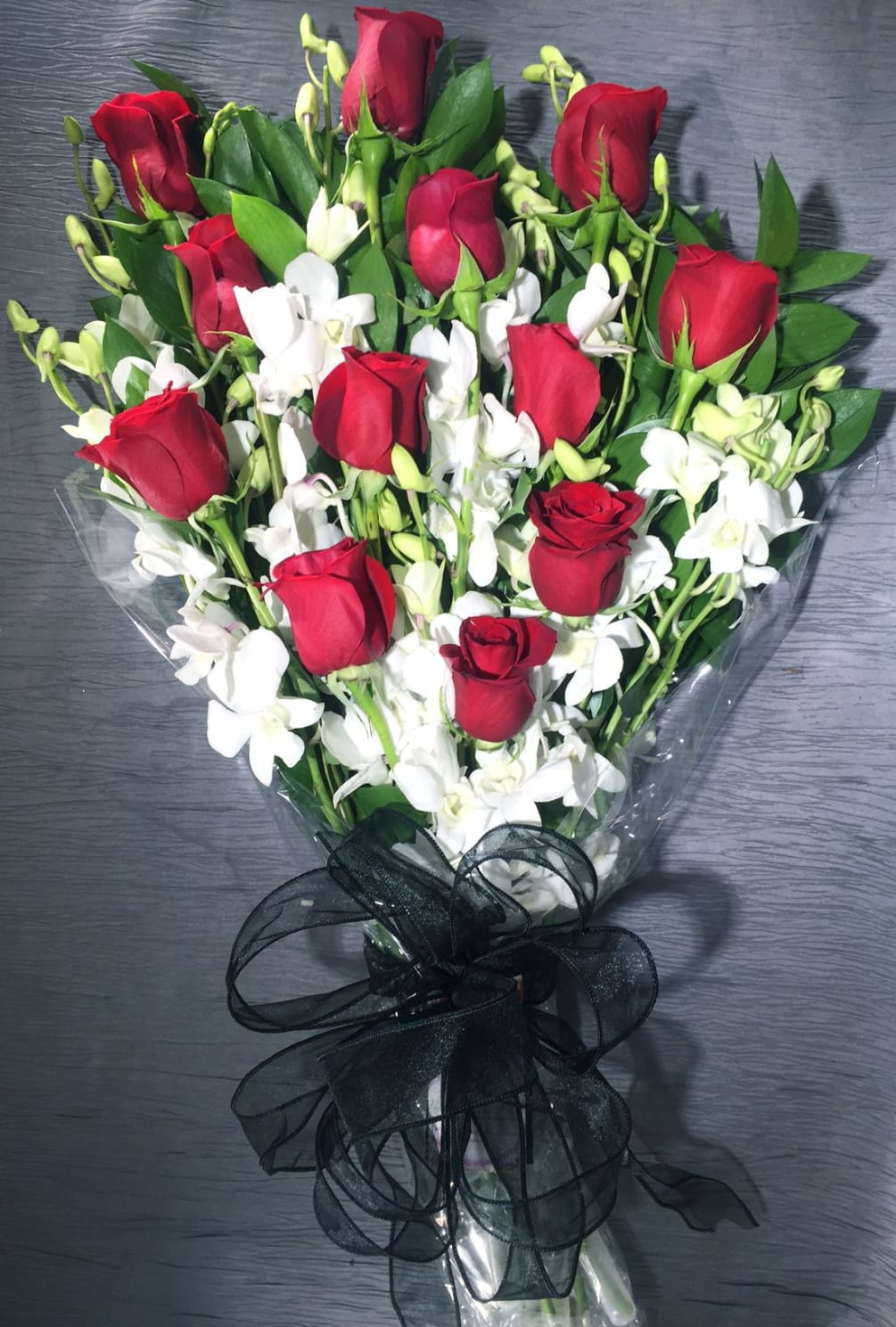 Dozen Long Stem Roses Wrapped By Flowers Of The Field