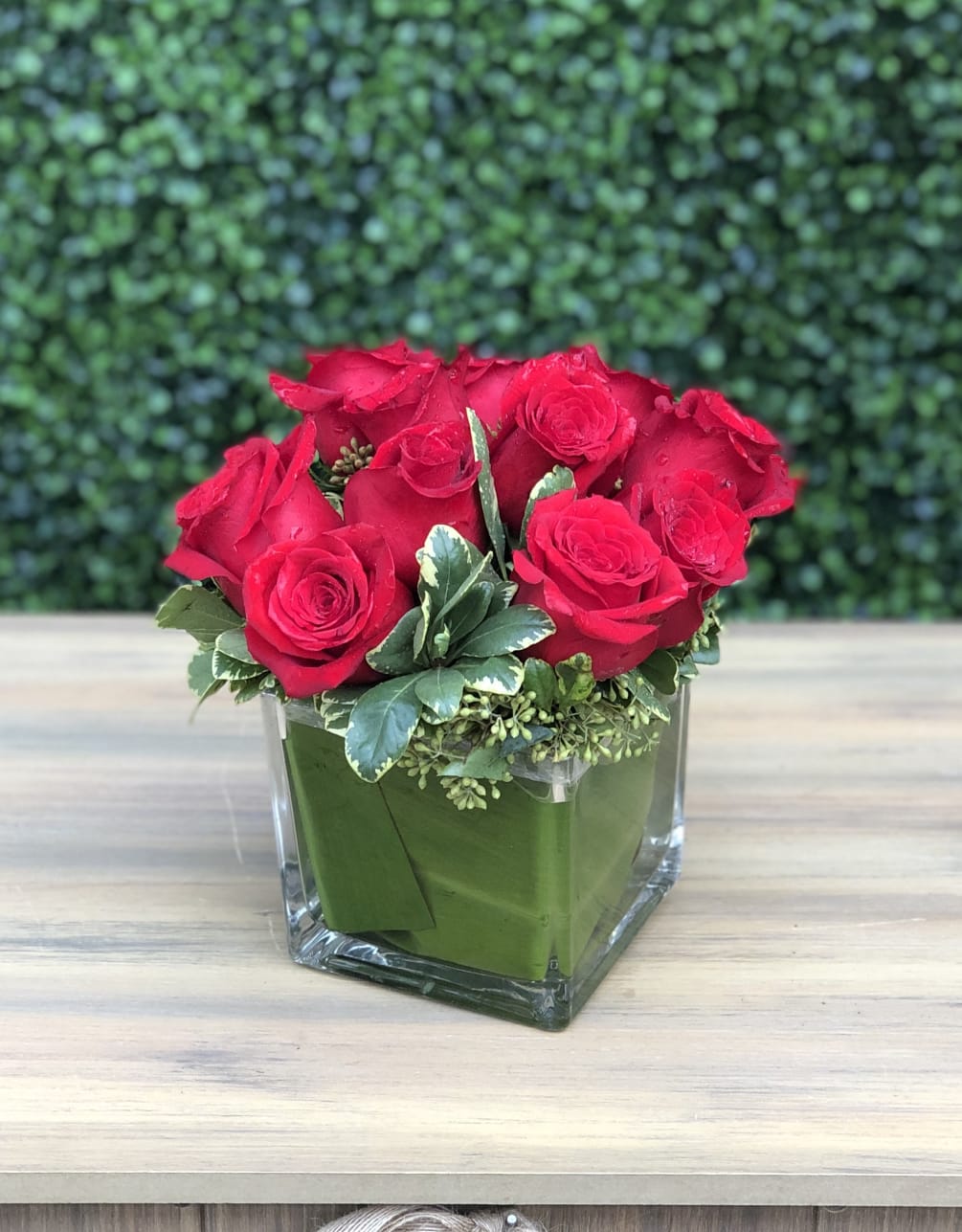 ONE DOZEN CLUSTERED ROSES by Hirni's Wayside Garden Florist