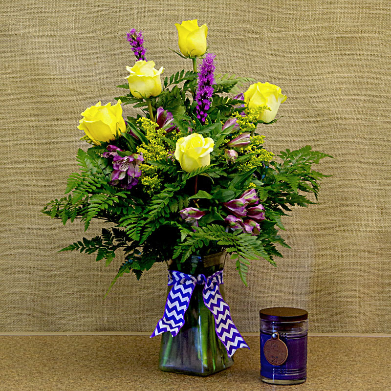 This mixture of yellow roses, liatris, purple alstroemeria and solidago is the