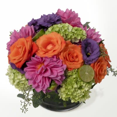Limes and Citrus Arrangement featuring Hydrangea, Roses, Dahlias, and Lisianthus. Bursting with