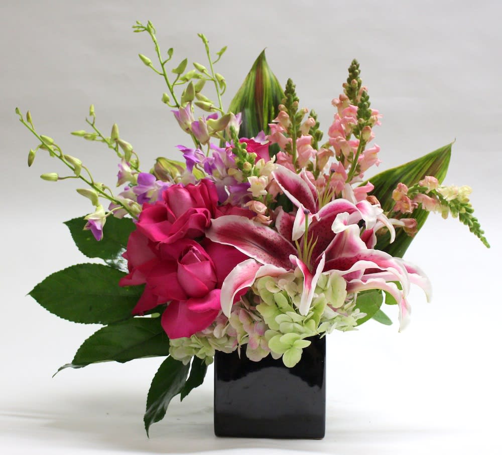 Pink Snap Dragons, Pink Orchids, Hot pink roses, star gazer lilies