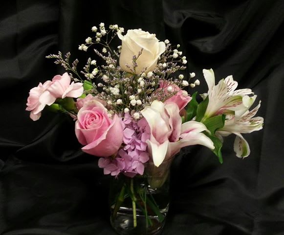 Roses, lilies, carnations and hydrangea. Small and beautiful! Need a friendship arrangement