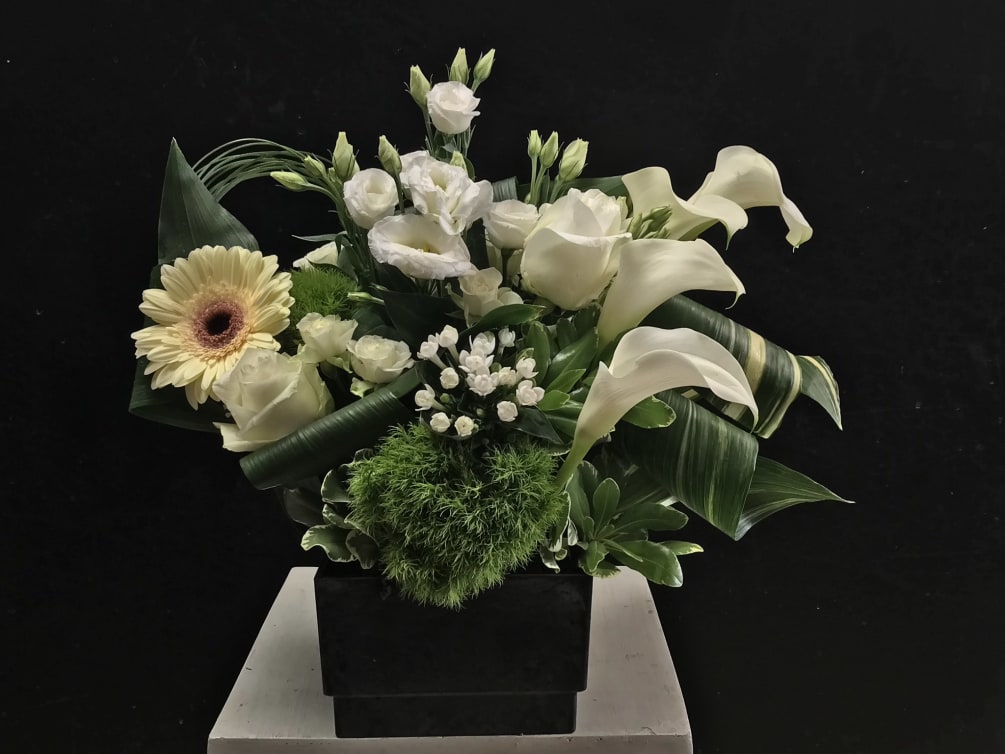 Tabletop arrangement that can communicate your sympathy or a just a calming