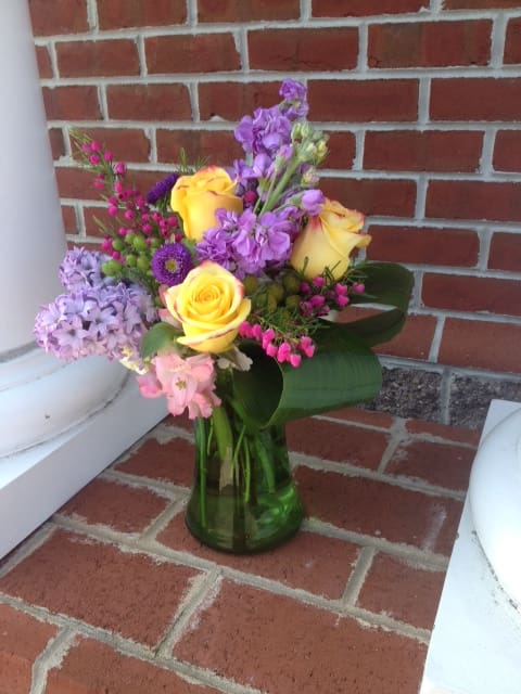 This is a classic spring mix of roses, hyacinth, alstromeria, stock, baronia
