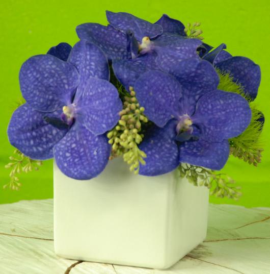 5&quot; White ceramic vase featuring Purple Vanda orchids, green dianthus accented with
