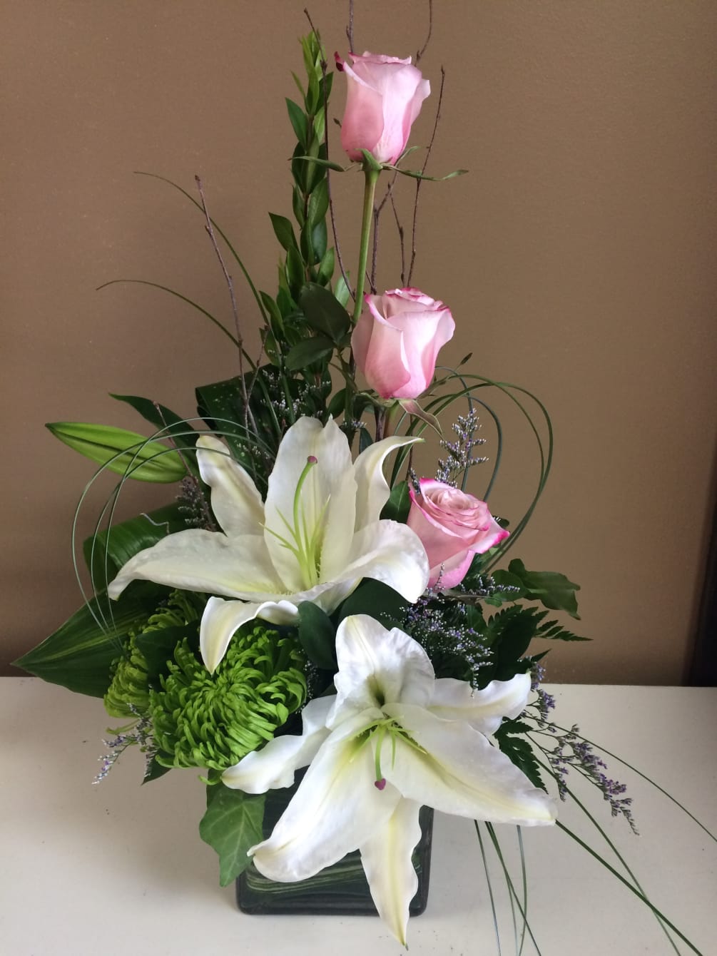 A beautiful arrangement of Roses and Lilies 