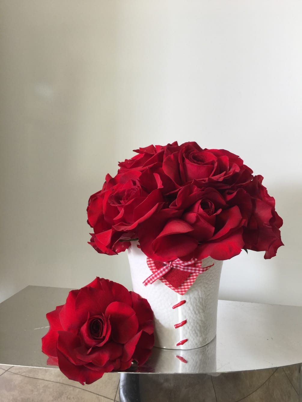 Petite desk arrangement with lovely red roses