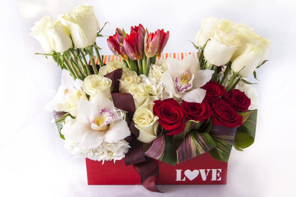 Assortment of red and white roses.