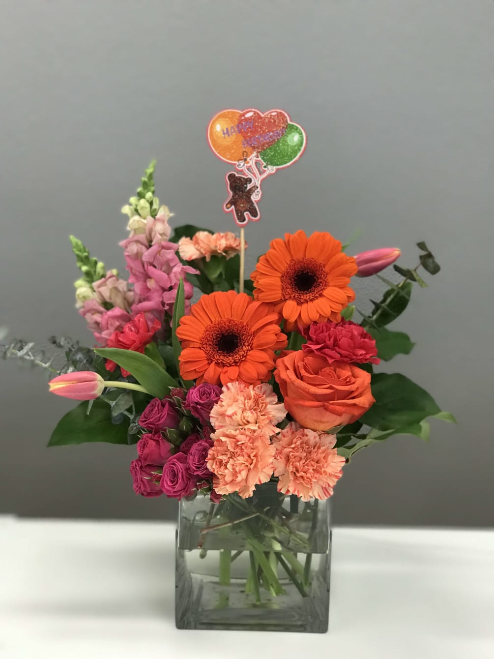 Bright oranges and pinks in celebration of loved ones who&#039;s special day