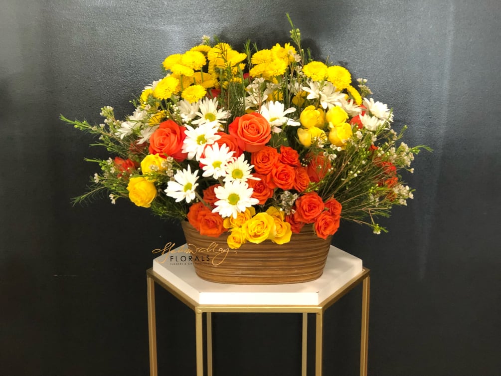 This beautiful basket is for the one you adorn, With orange and