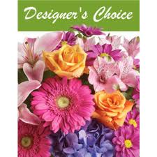 Beautiful seasonal flowers chosen by one of art talented designers arranged for