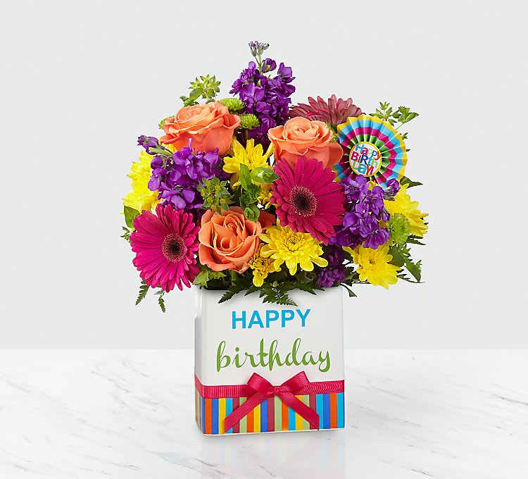 Bright birthday arrangement with Gerbera daisies and festive bright flowers for any