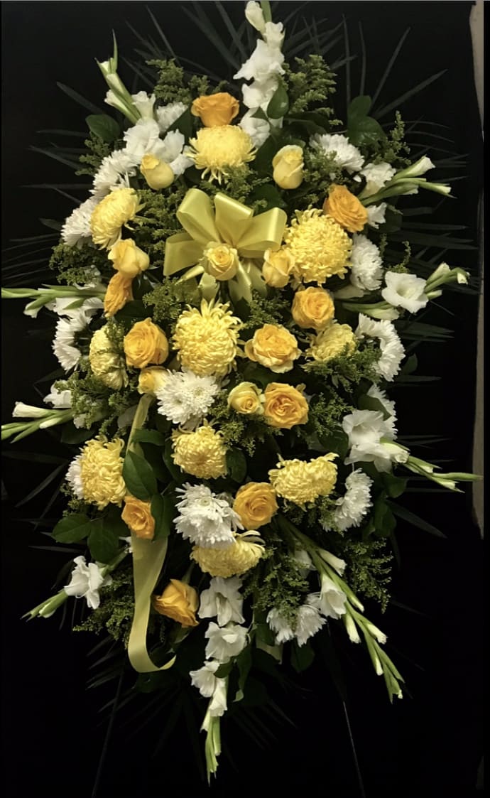 Beautiful standing spray with yellow and white flowers