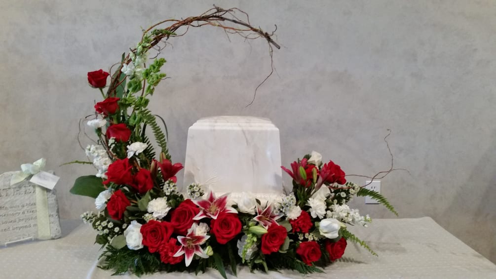 A beautiful tribute to your loved one, accented with classic red and