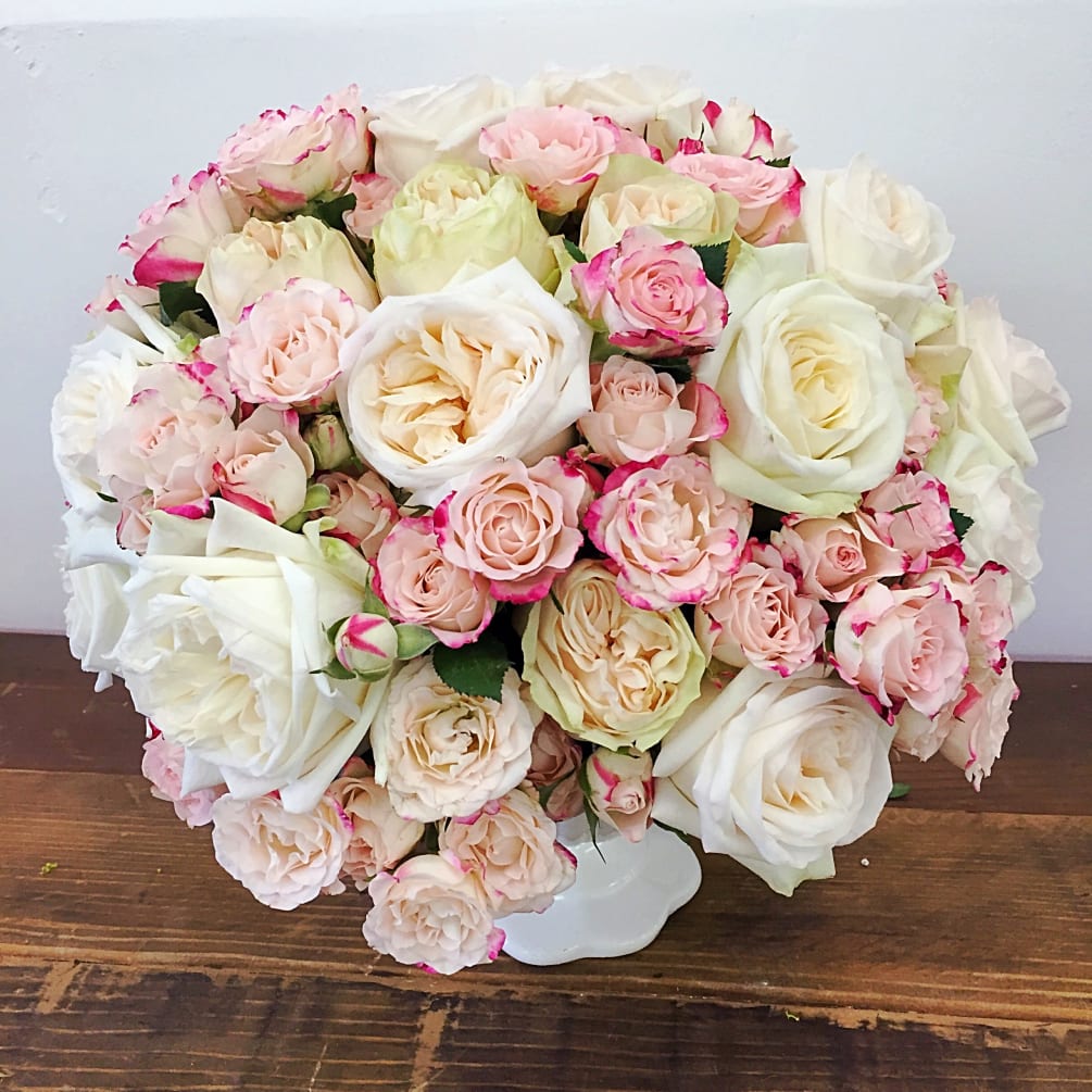 This Luxurious Beauty is Filled with Fragrant Shades of Pink Garden Roses.