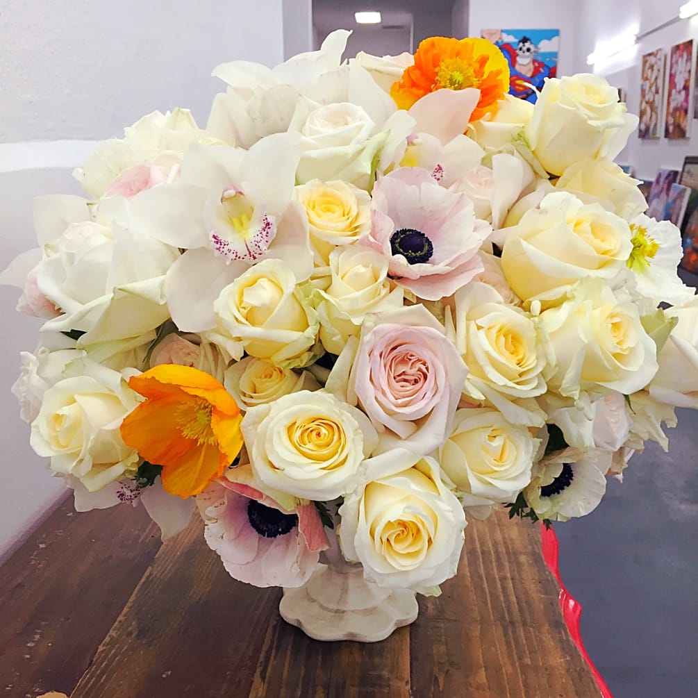 This XL beauty is full of creamy roses, blush anemones, pale pink