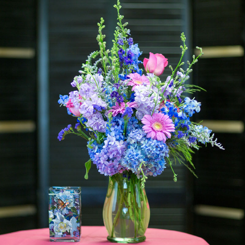 This arrangement is beautiful, with many shades of purple, pink and blue.