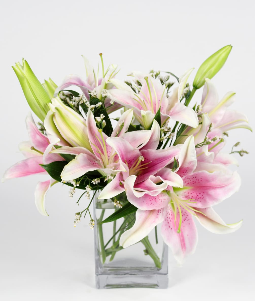  A classic gathering of fragrant pink and white lilies accent with