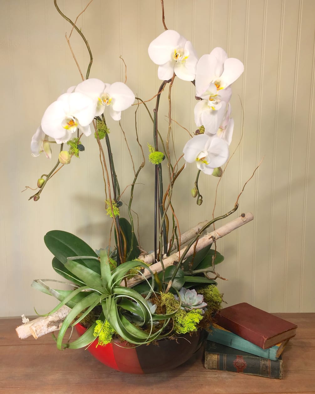 This amazing piece is simply one of a kind. No two phalenopsis