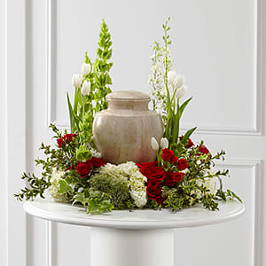 The FTD&reg; Tears of Comfort&trade; Arrangement is an elegant and sophisticated way