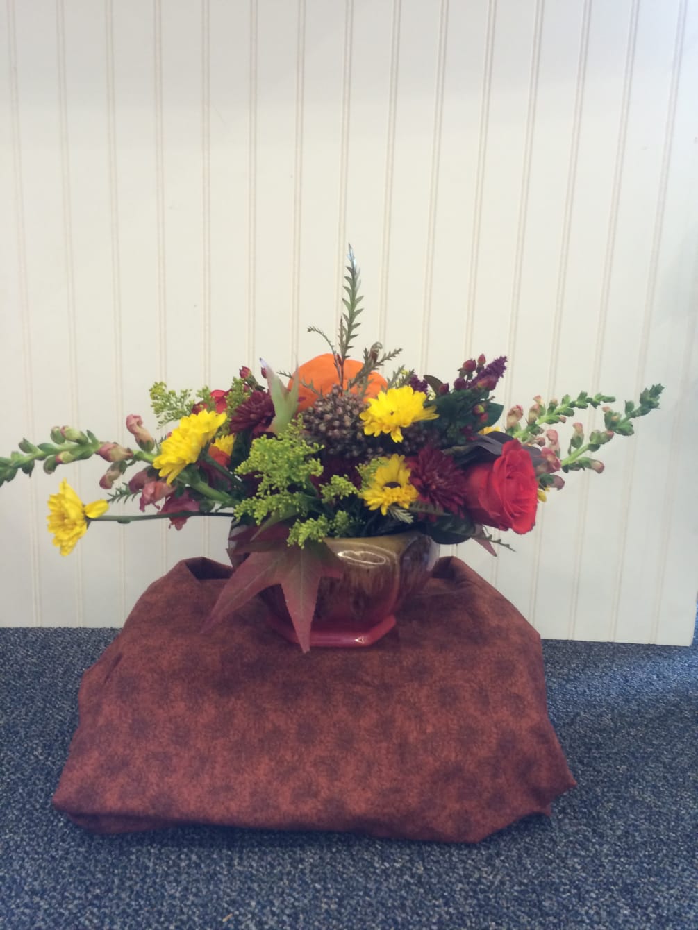 Fall at it&#039;s finest, filled with roses, mums, hypericum berries, snapdragons and