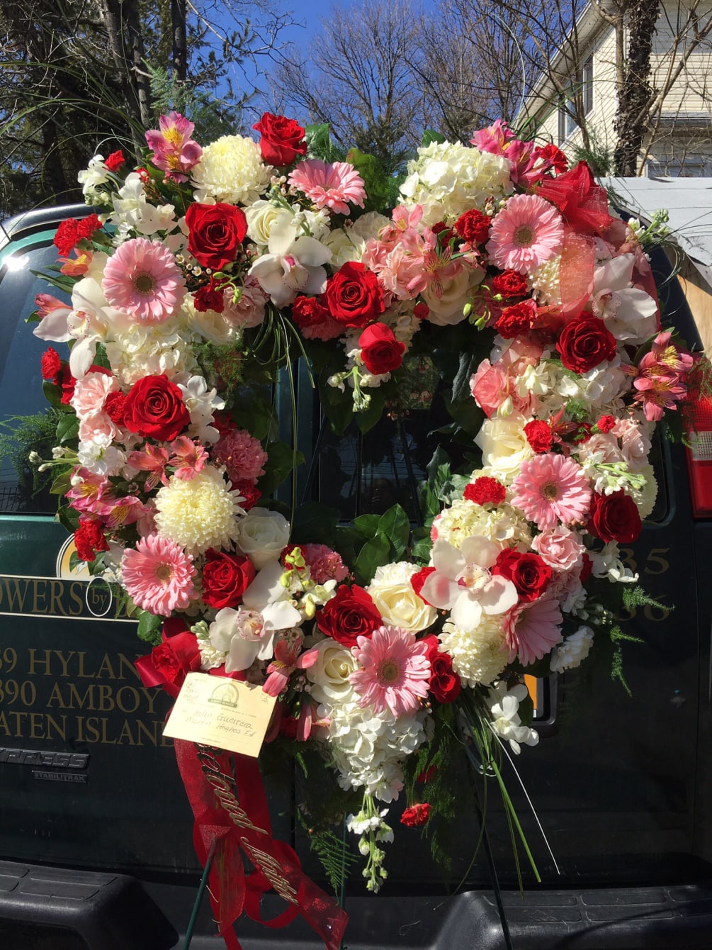 Open Heart Wreath Pink White And Red By Flowers By Bernard