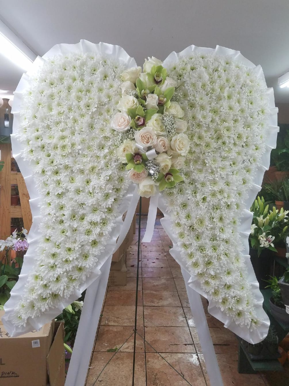 Angel wings by Bouquets & Baskets