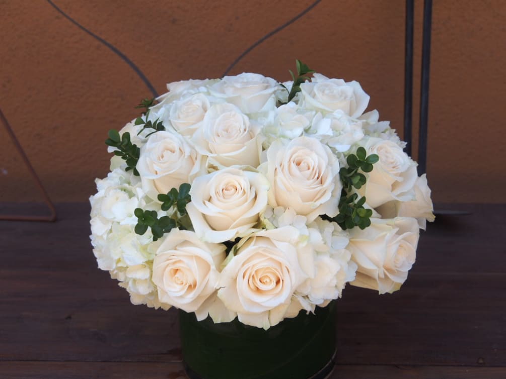 Two dz. off white roses with hydrangeas 