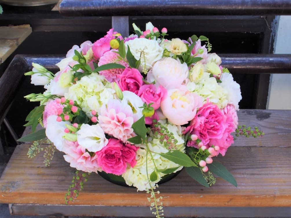 Mix of pinks and white flowers, lots of texture. Some of the