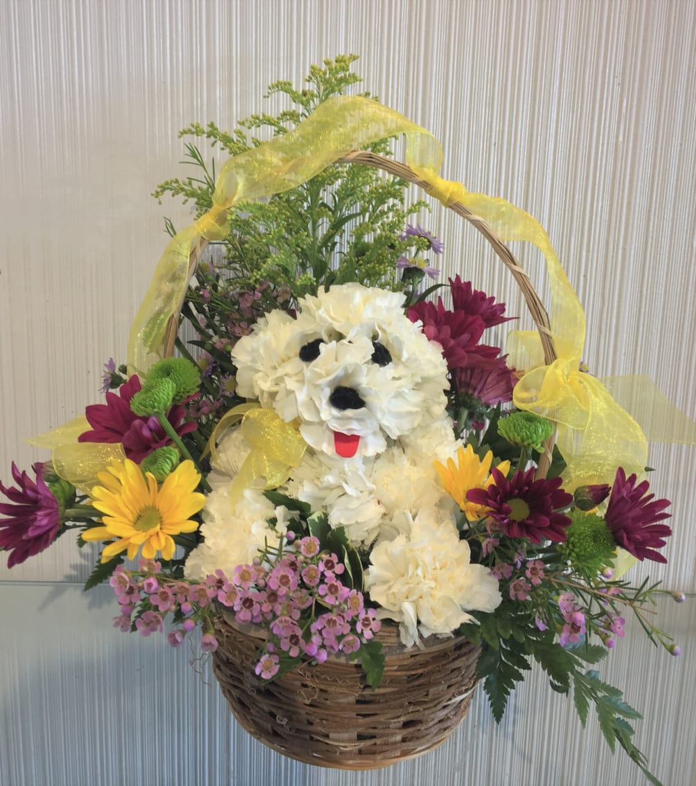 Unleash the smiles with our original Puppy Basket arrangement! Hand-designed inside a