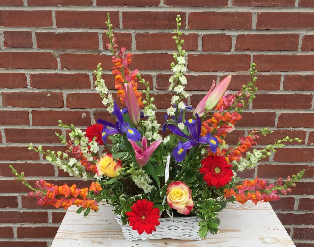 Colorful Basket Arrangement of Seasonal Flowers