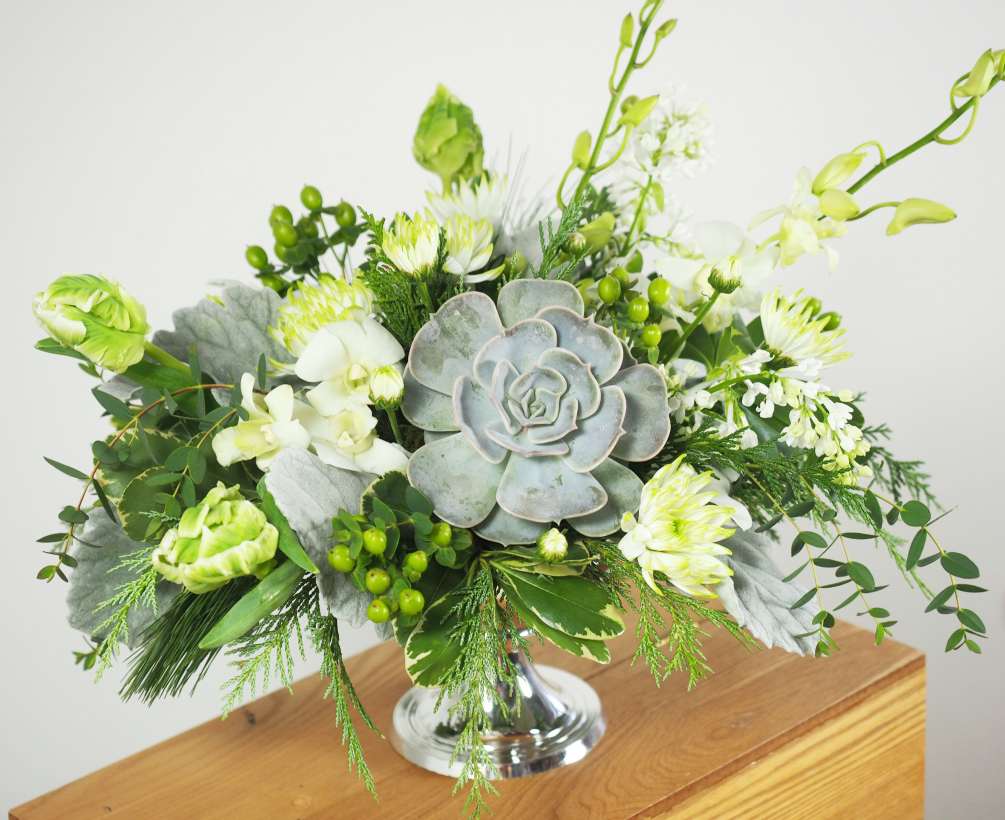 Contemporary, garden style arrangement created in a metallic compote bowl with a