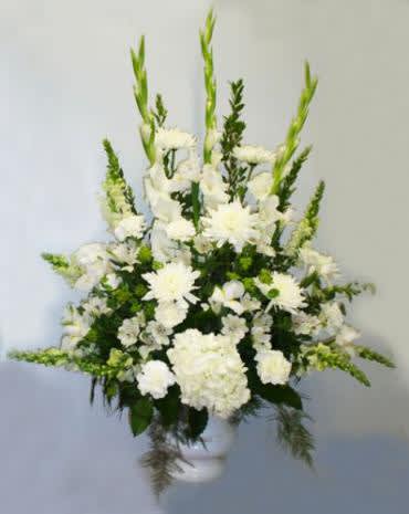 This Memorial Arrangement offers a beautiful way to convey your most heartfelt
