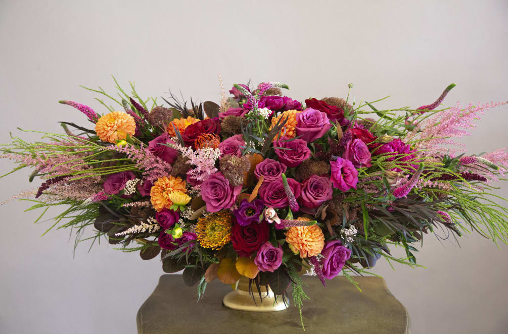 A beautiful fall arrangement with vibrant colors 