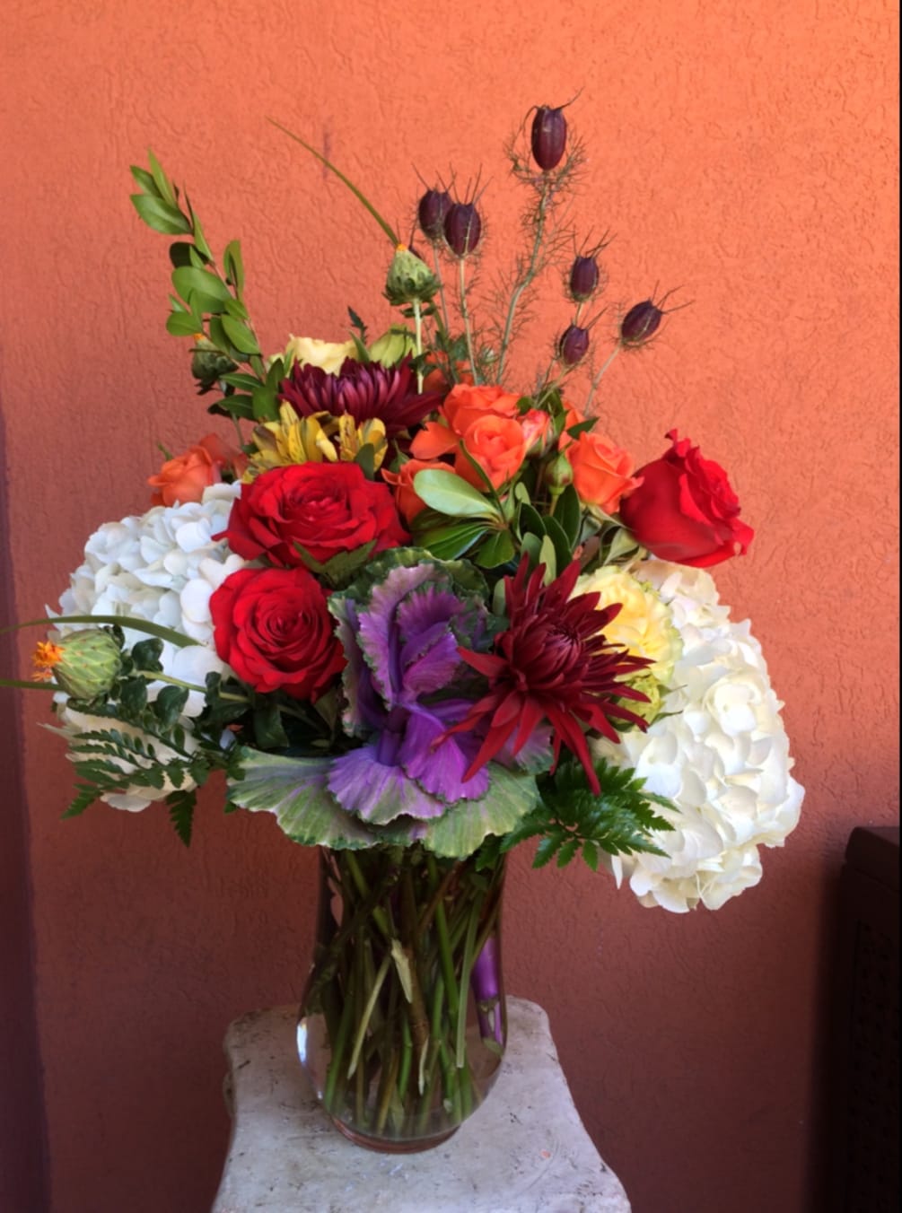 Brighten her day with this bright and happy floral arrangement 